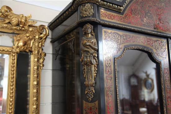 A mid 19th century French red boulle work and ebony bookcase, W.4ft 1in. D.1ft 6in. H.7ft 10in.